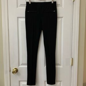 Black pleated skinny pants